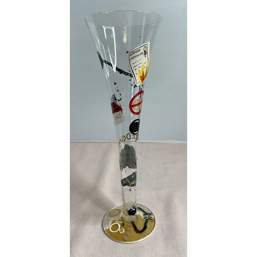 LOLITA - DIVORCE CHAMPAGNE FLUTE GLASS HAND PAINTED. SOME PAINT WEAR ON GLASS.